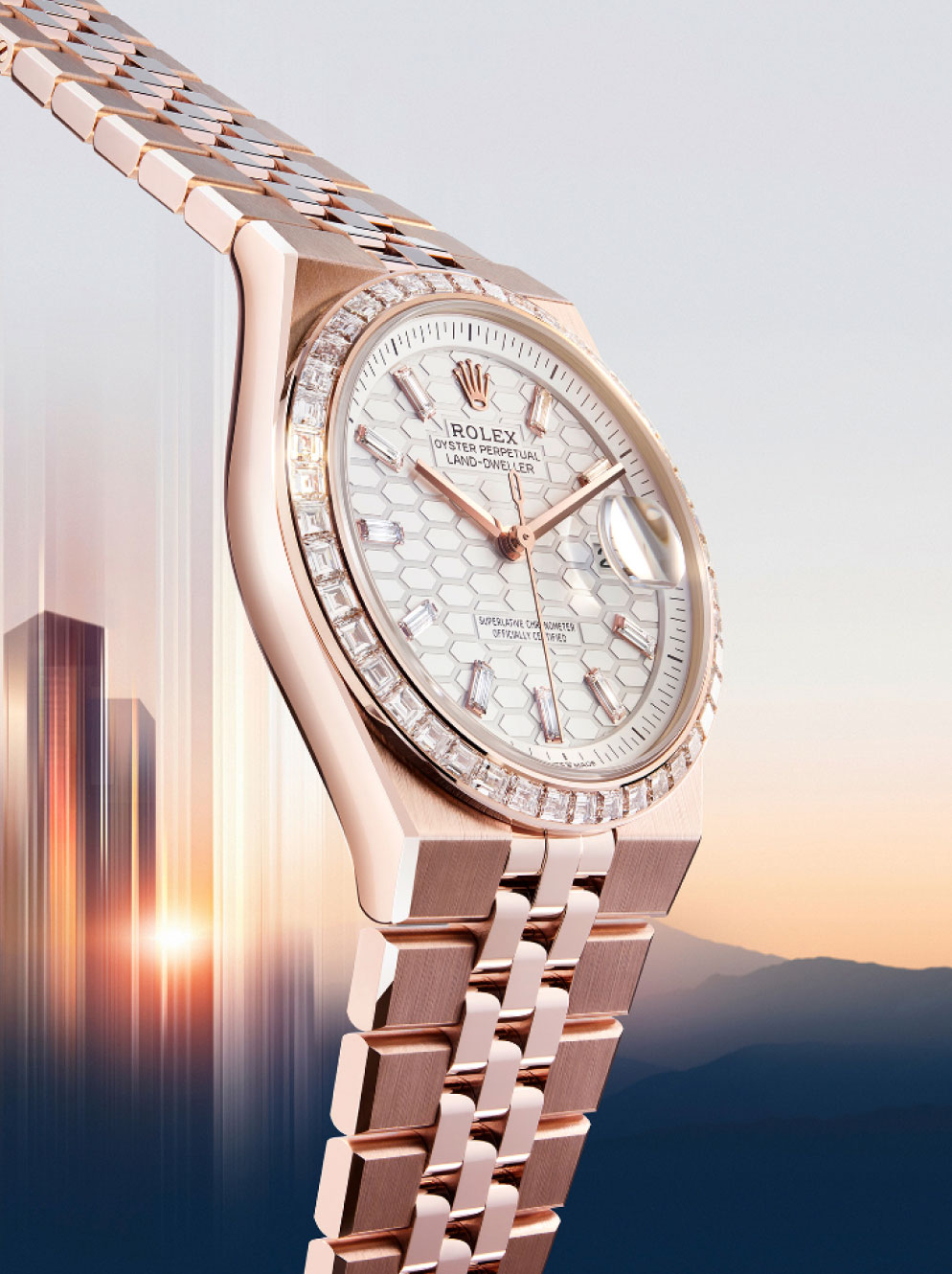 Close-up of the watch on bracelet at sunrise