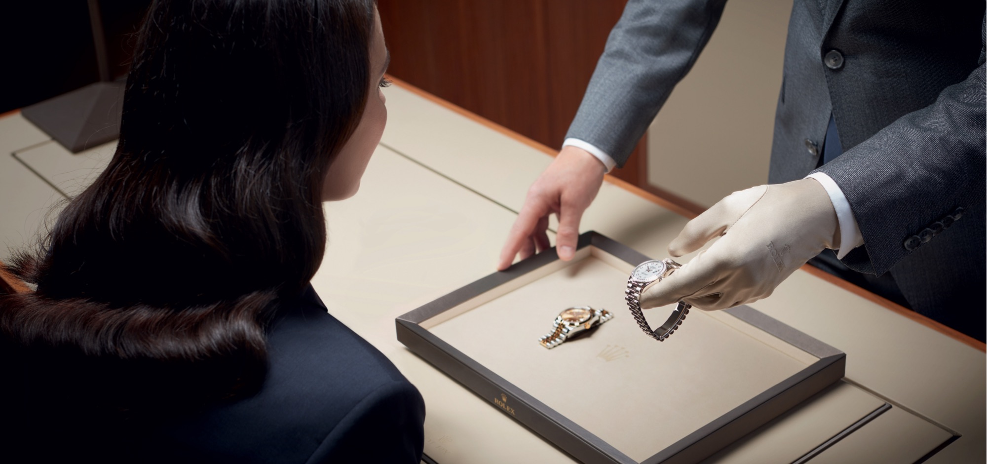 Watchmaker inspecting a Rolex movement